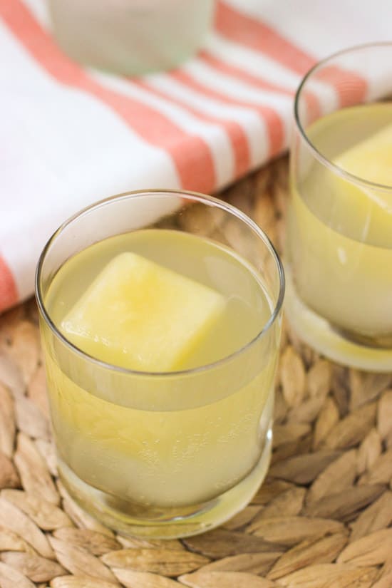 fizzy pineapple ginger cocktails with pineapple ice cubes