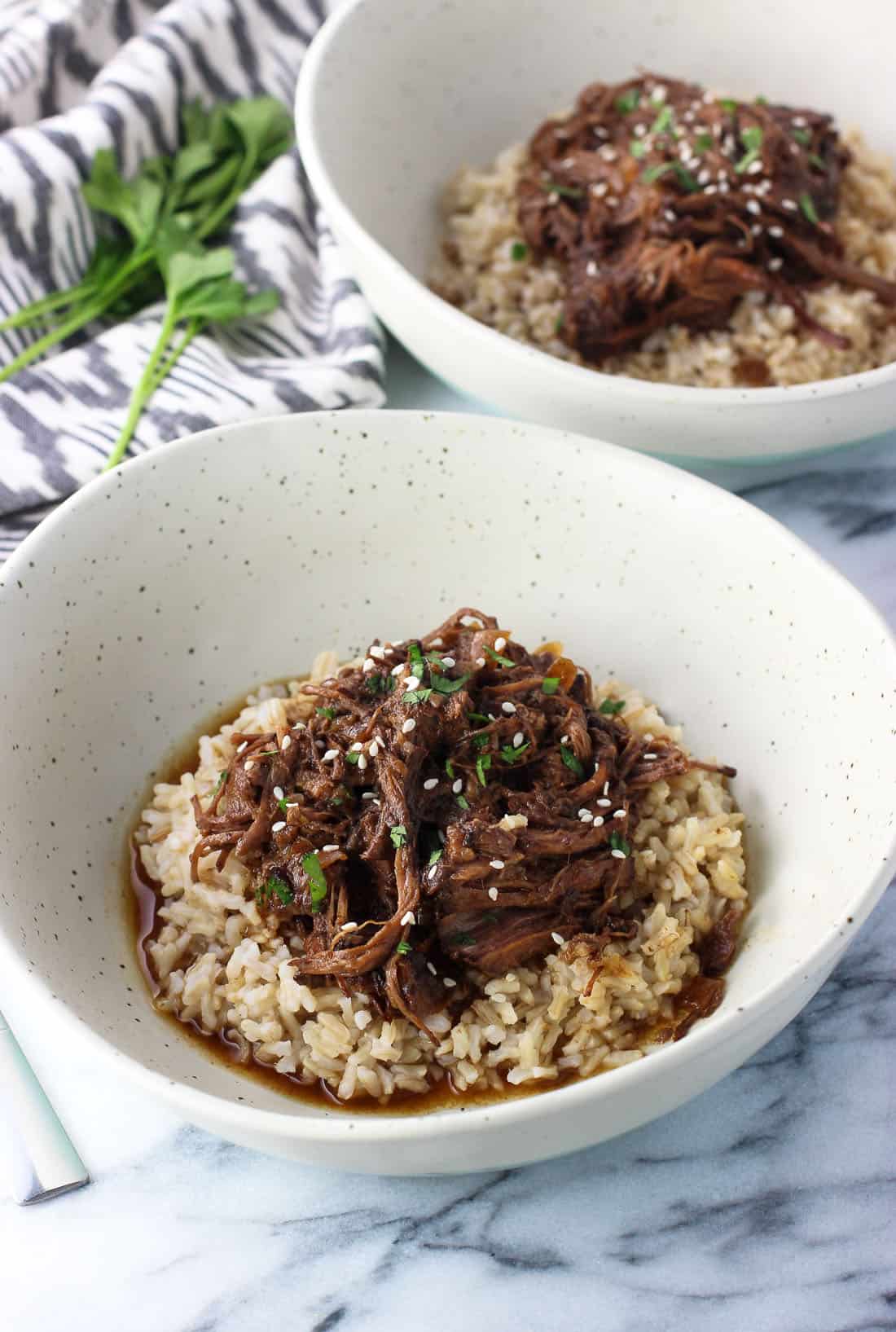 slow cooker shredded beef with balsamic peanut sauce