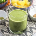 This pineapple matcha vanilla smoothie recipe features baby kale, flaxseed, and Greek yogurt for a healthy and flavorful on-the-go breakfast or anytime pick-me-up.