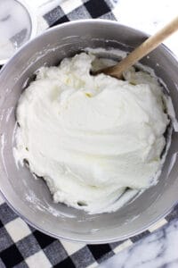 Stabilized whipped cream is so easy to make at home and makes a big difference in pies, trifles, and many more desserts. A quick extra steps helps ensure leftover portions of recipes with whipped cream stay fluffy for days.
