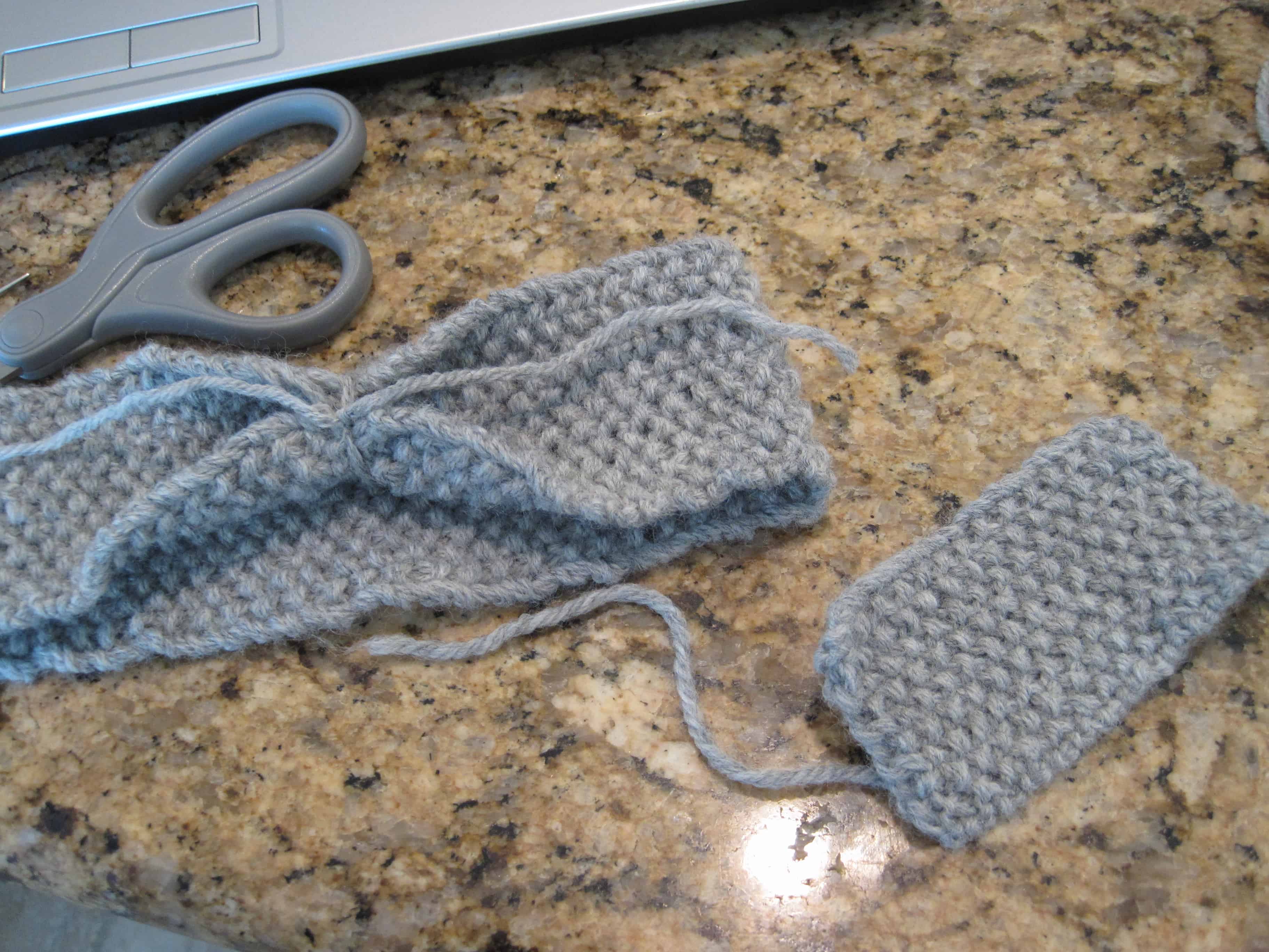 A knit bow headband in process.