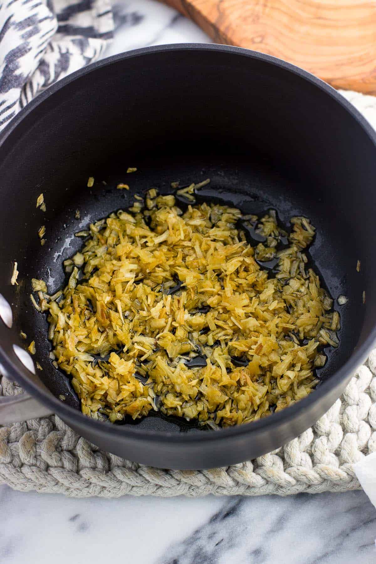 Dried minced onion in a small saucepan with oil