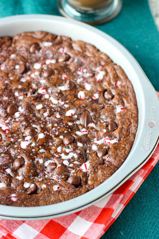 Peppermint mocha cookie cake in a round metal cake pan.