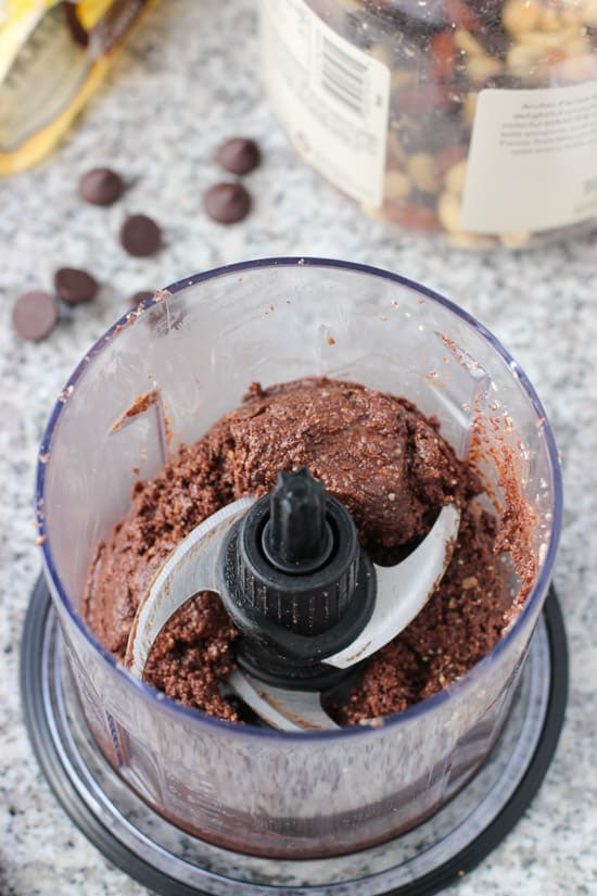 Trail mix bite mixture in the food processor after blending.