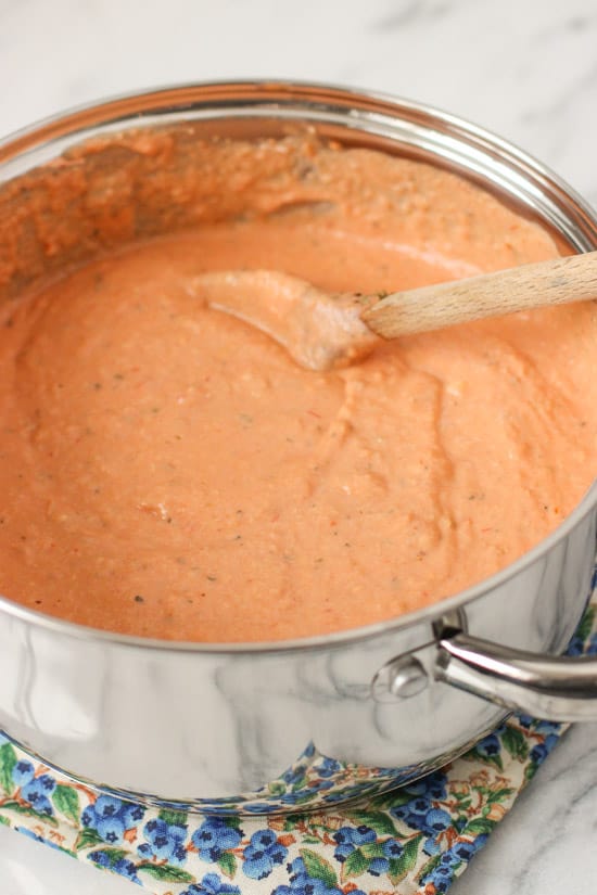 Italian dip melted and combined in a medium saucepan with a wooden spoon.