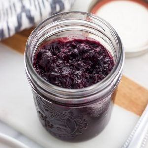 A glass jar full of jam