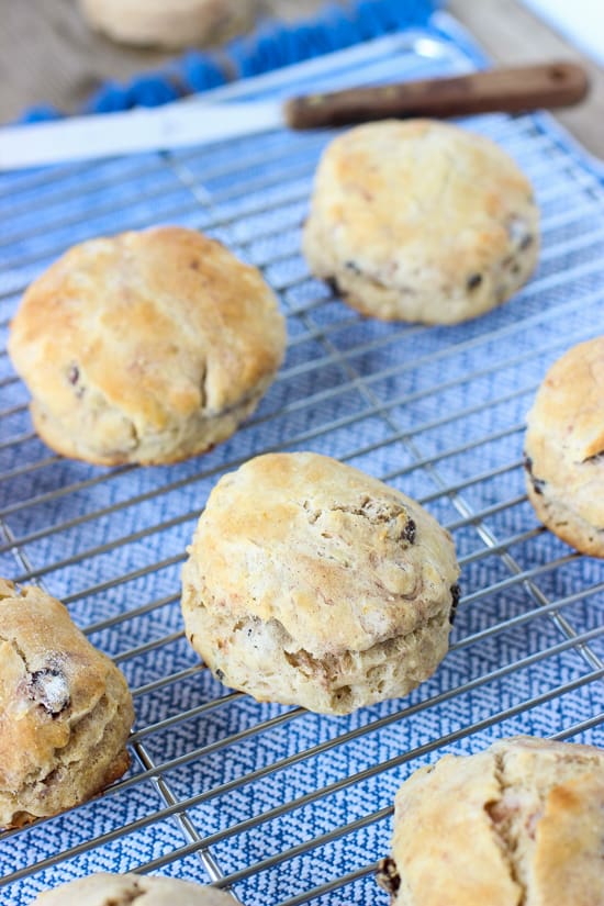 Biscuits on a rack set over a linen placemat.