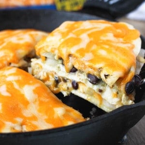 A wedge of tortilla pie being lifted out of the pan by a spatula.