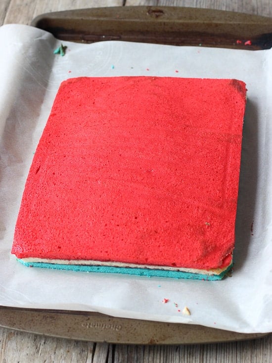 A slab of red, white and blue colored rainbow cookies before being cut into slices