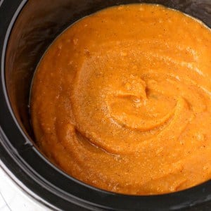 Pureed sweet potato soup in a slow cooker.