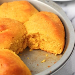 One roll removed from the pan after baking.