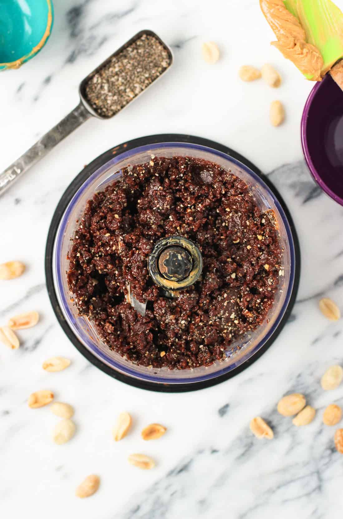 The bar ingredients in the food processor after blending.