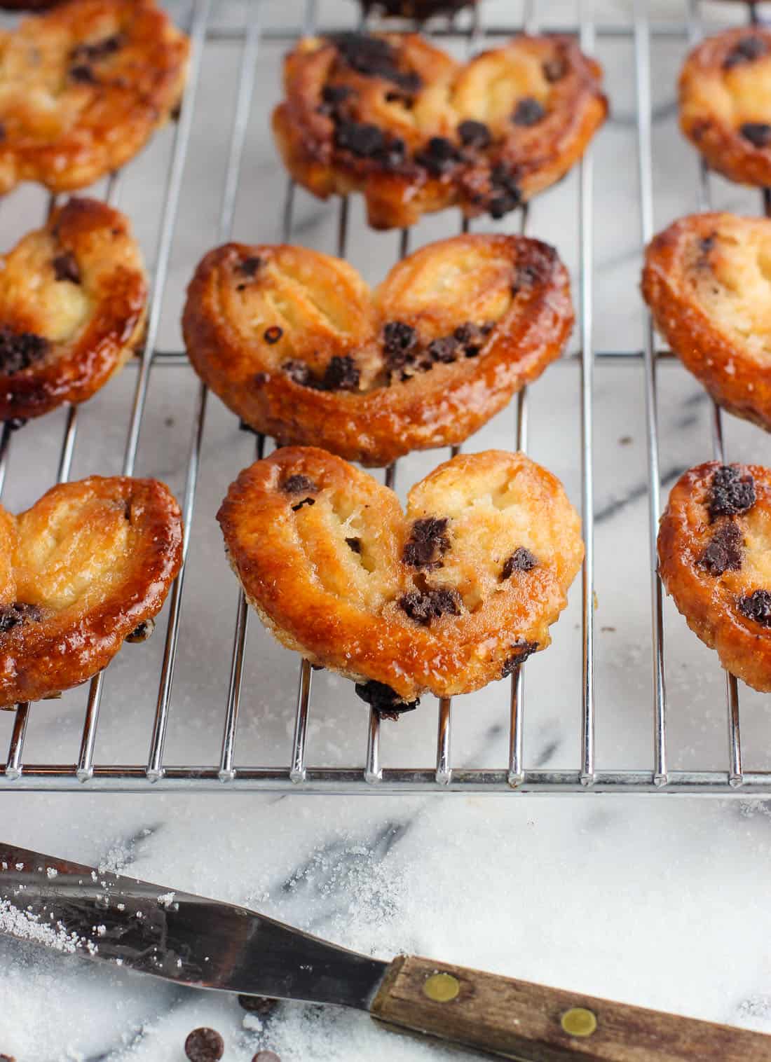 Baked palmiers on a metal wire rack