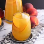 Mango peach white sangria is a fruity, refreshing, and just-sweet-enough spin on a classic cocktail. Perfect for summertime entertaining!