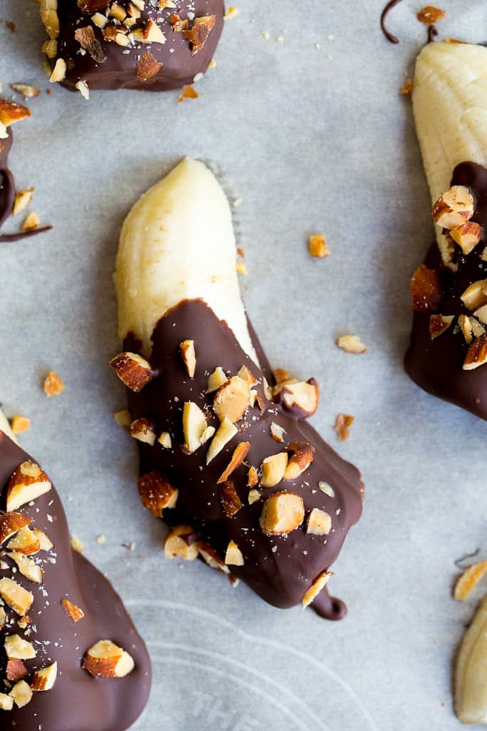 Mini Chocolate Covered Frozen Bananas with Almonds - She Likes Food