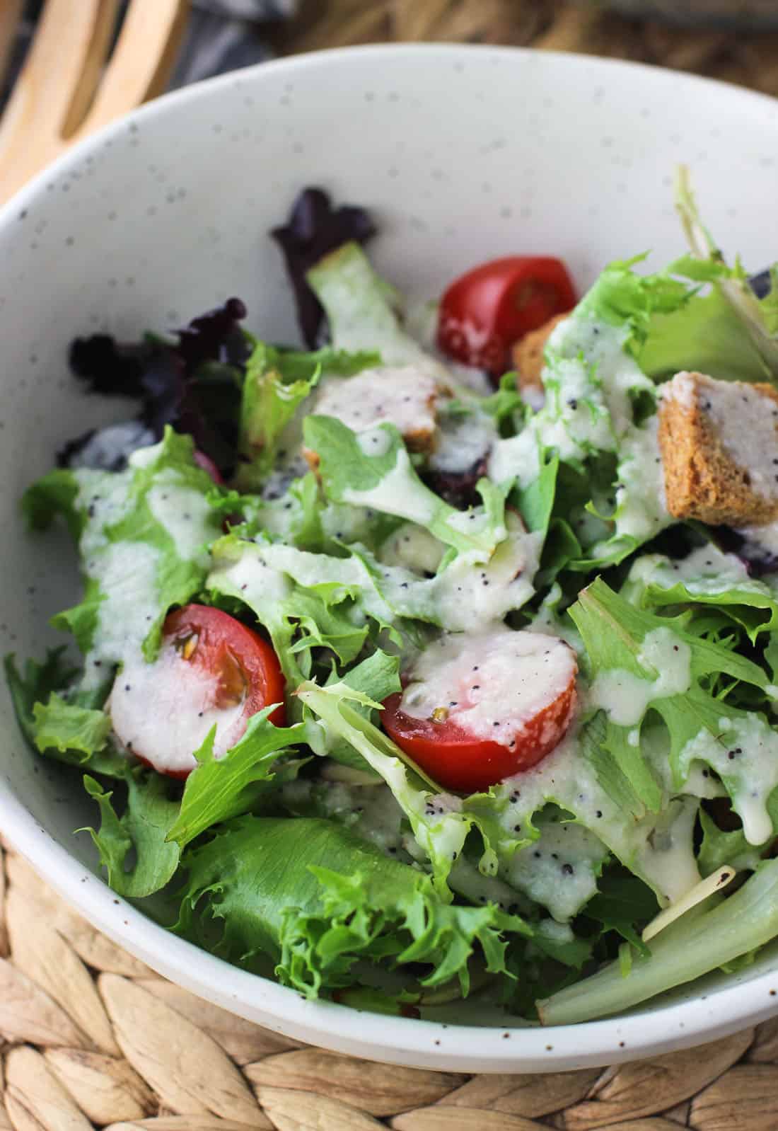 Sweet Onion Poppy Seed Salad Dressing is bursting with flavor and made with healthy oils for a bold and very lightly sweetened salad dressing.