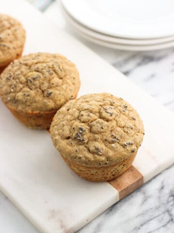 Muffins arranged on a marble board for serving