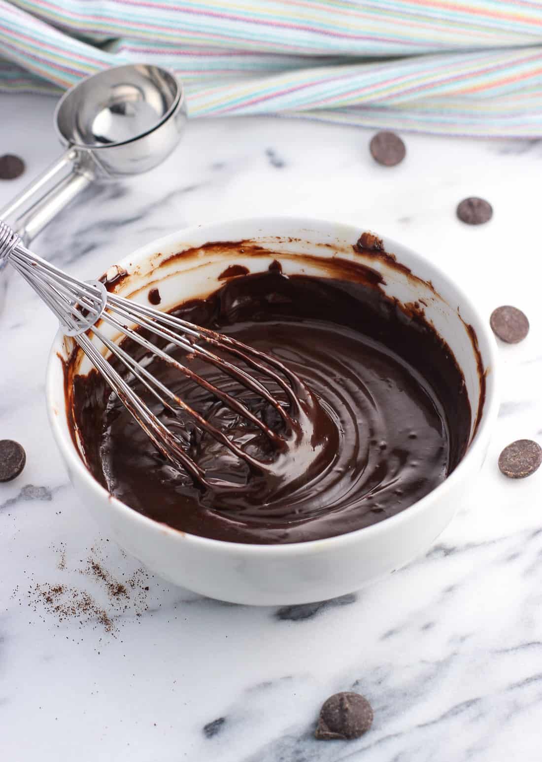 The ingredients melted together in a bowl until smooth with a whisk dipped in