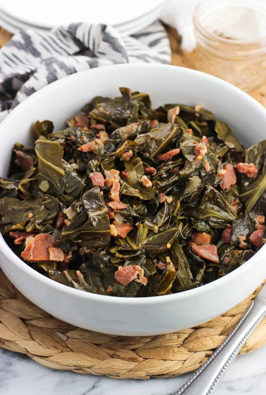 A serving bowl of collard greens.