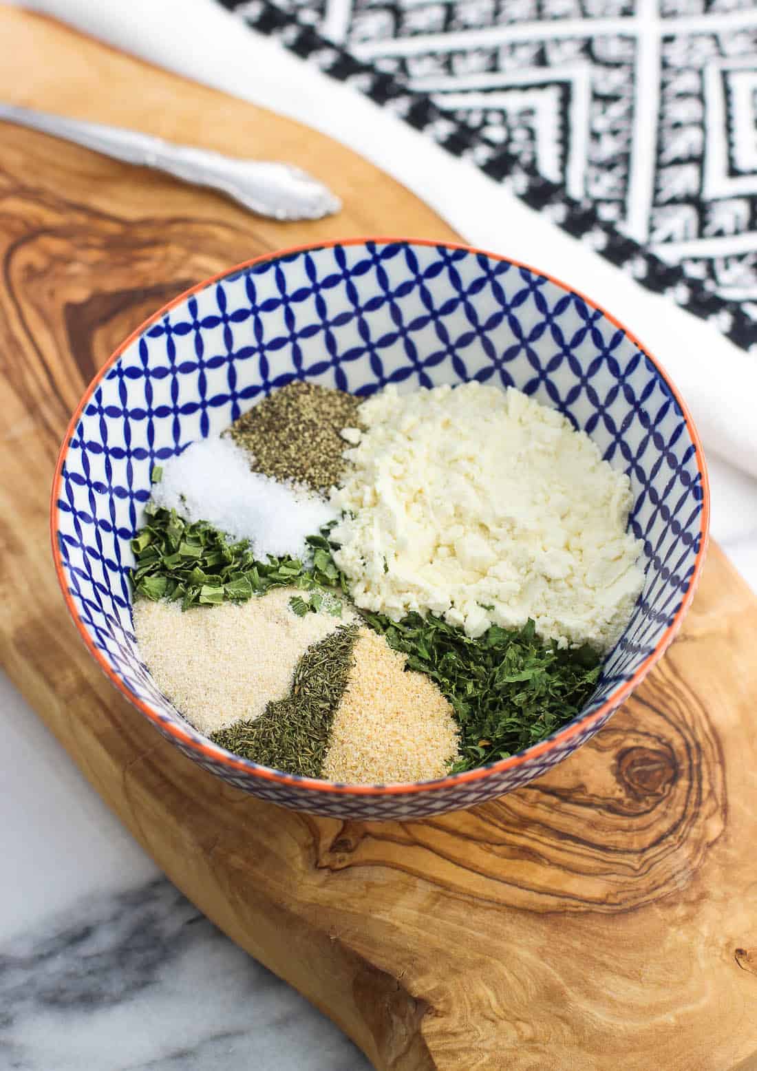 Ranch seasoning ingredients in a small bowl before being mixed up.