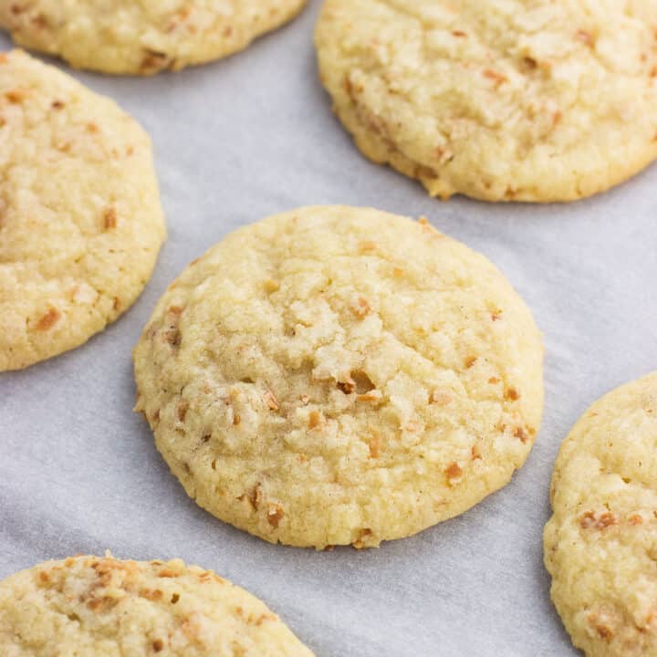 Cookies on a parchment-lined baking sheet.