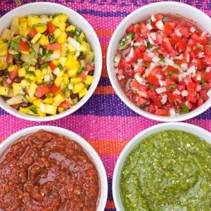 This DIY salsa bar is sure to impress your guests! Featuring four make-ahead homemade salsas, this salsa bar can be customized just to your liking.