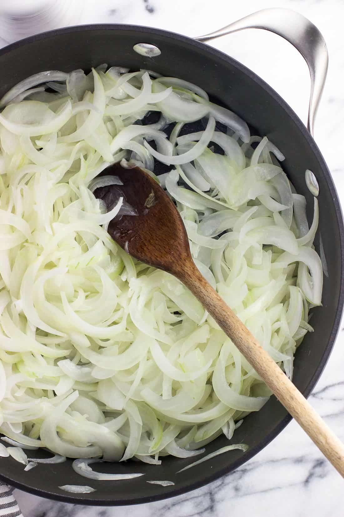 Curious how to make caramelized onions? It's not hard! Three ingredients are all you need to make this simple condiment that takes any meal up a notch. Caramelized onions make a great addition to sandwiches (especially grilled cheeses), salads, omelettes or frittatas, and more.