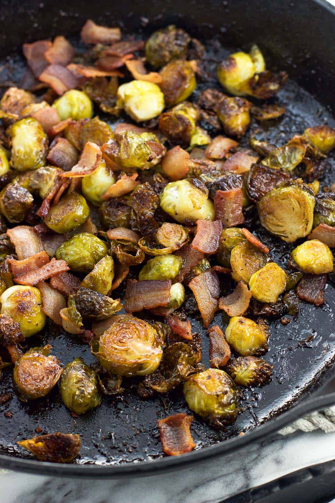 Bacon and brussels sprouts in a cast iron skillet