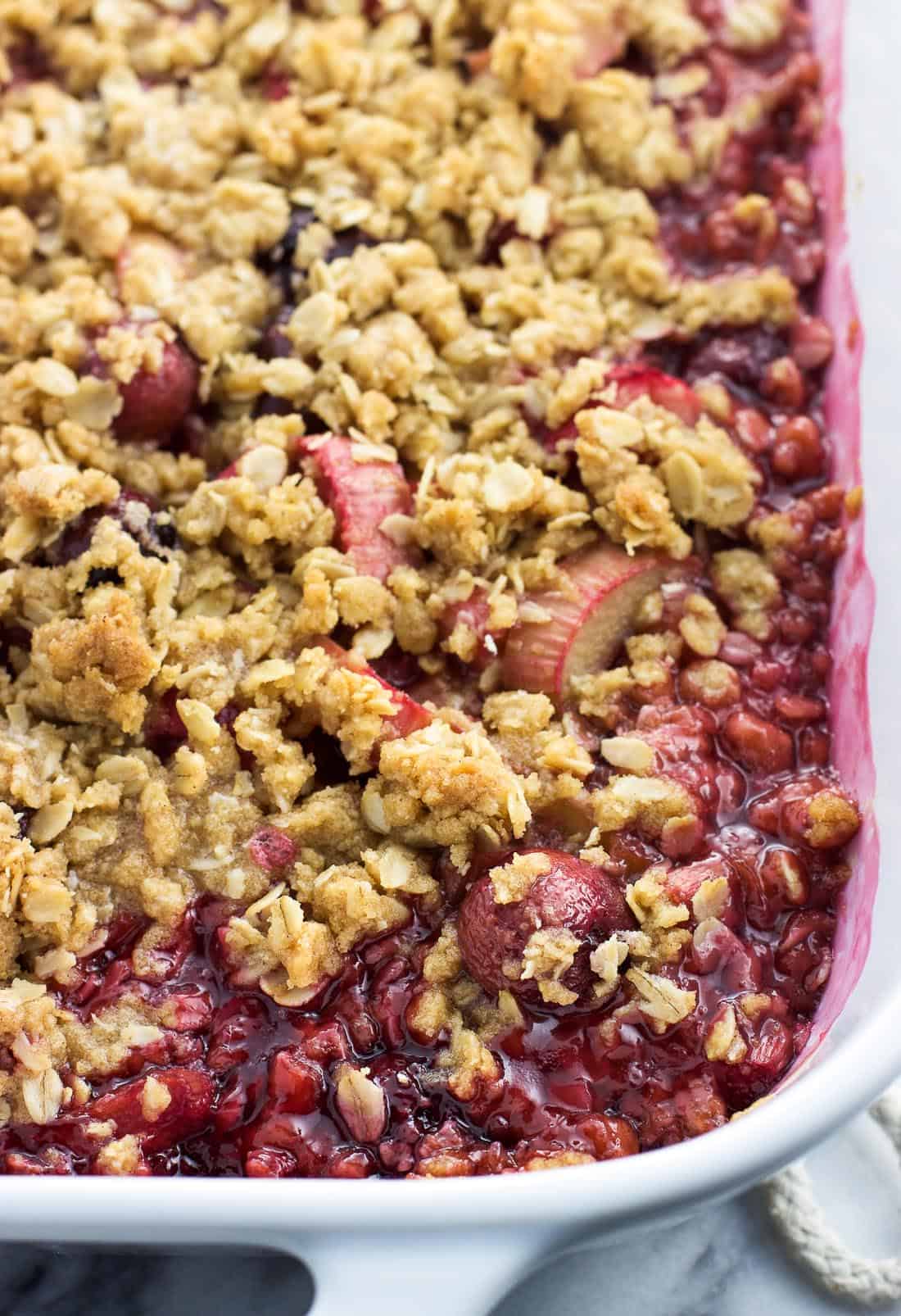 Baked cherry rhubarb crisp in a baking dish