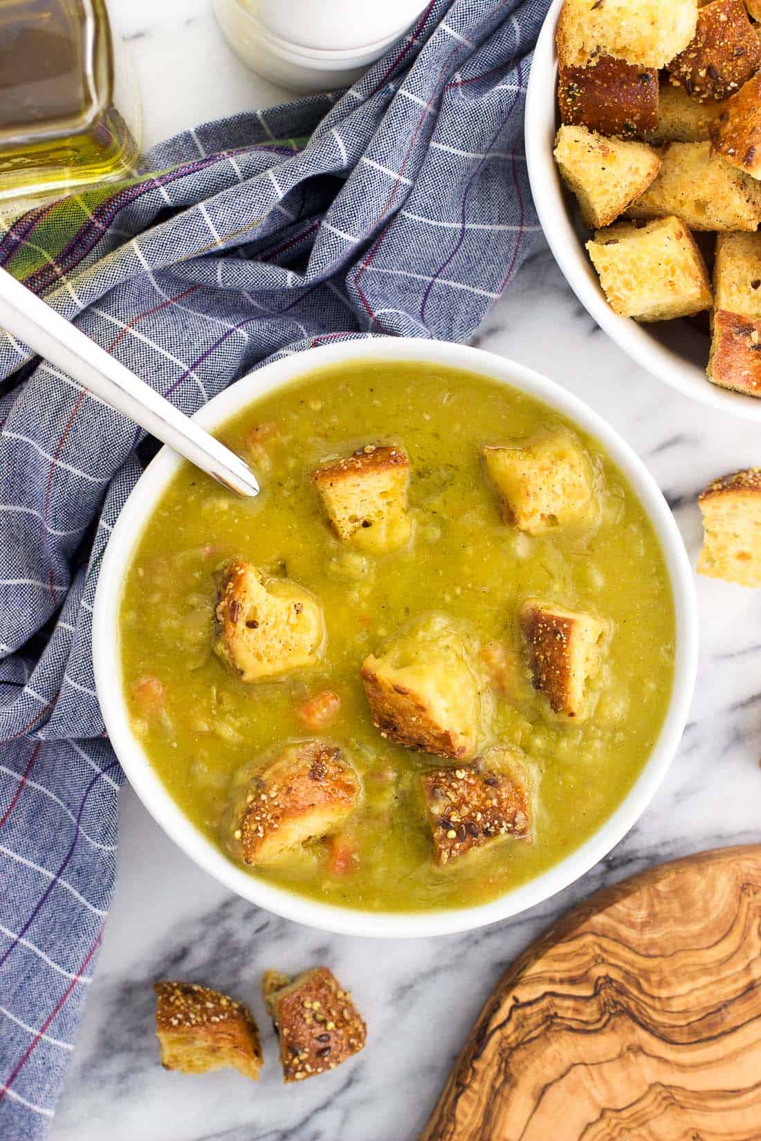 Split pea soup with croutons in a bowl for serving.