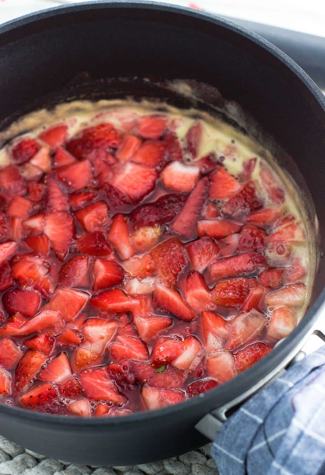 Chopped strawberries and the other syrup ingredients in a saucepan