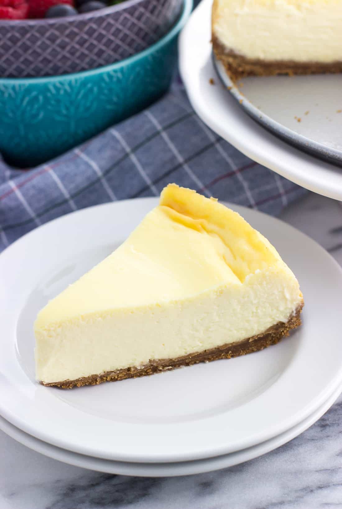 A slice of cheesecake on a plate