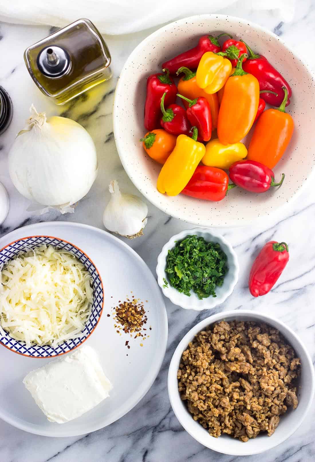 An overhead picture of all of the recipe ingredients separated out on a marble board.