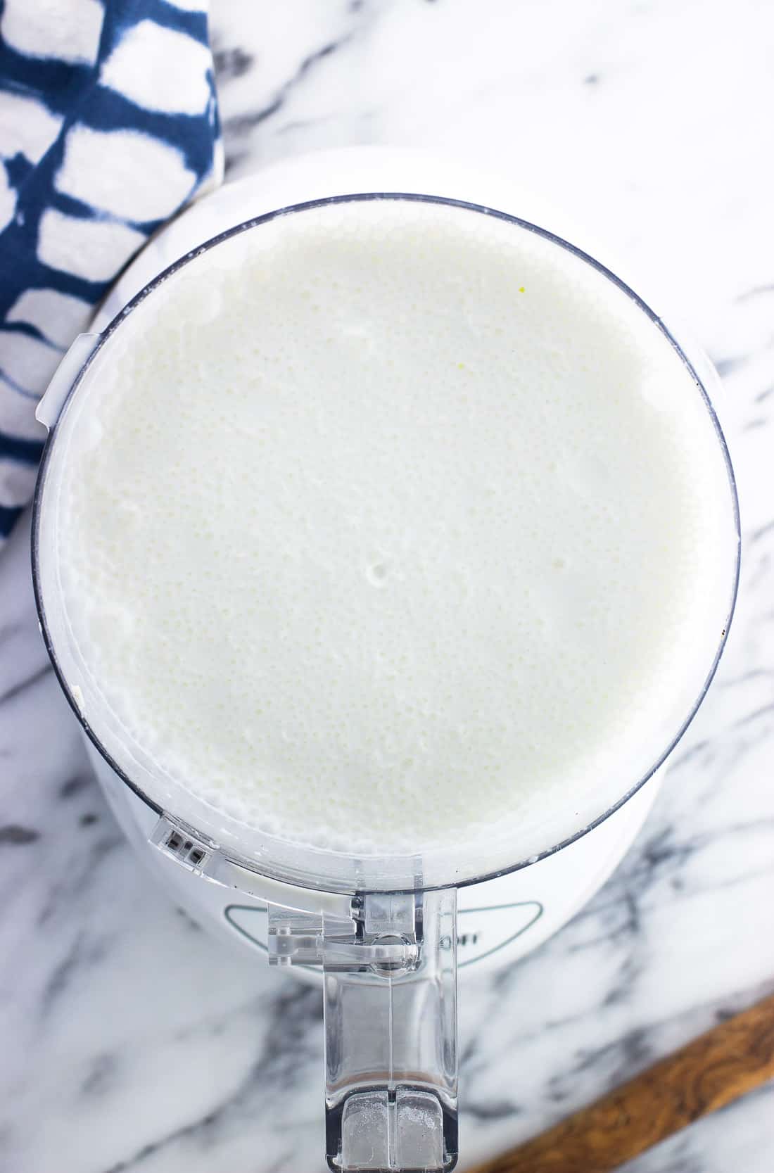 Blended healthy alfredo sauce in the food processor
