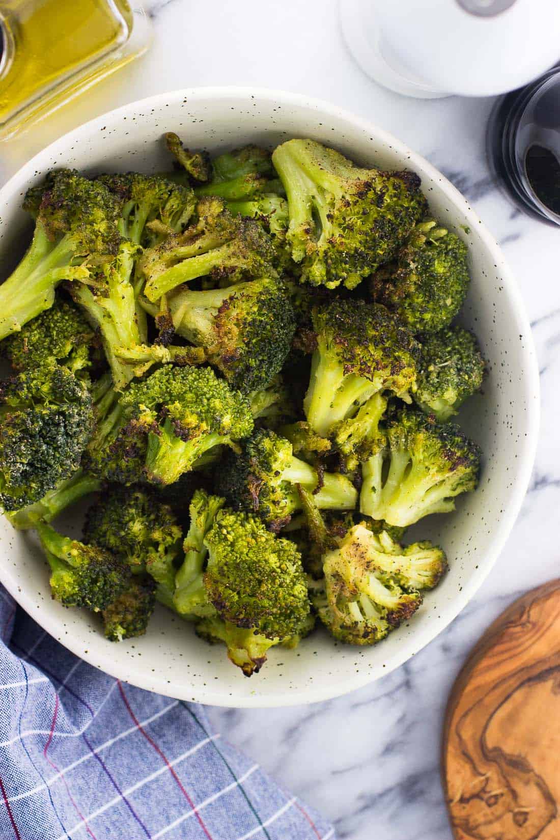 A bowl of roasted broccoli ready for serving.