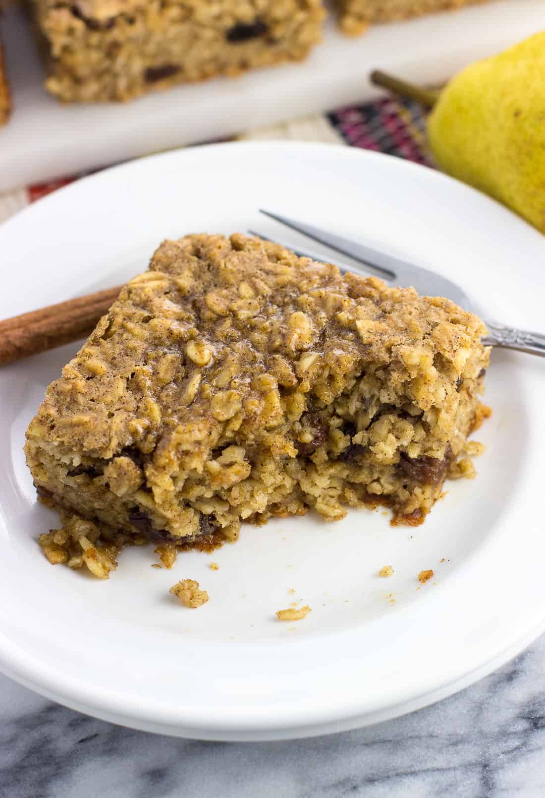 A piece of peanut butter baked oatmeal on a small plate.