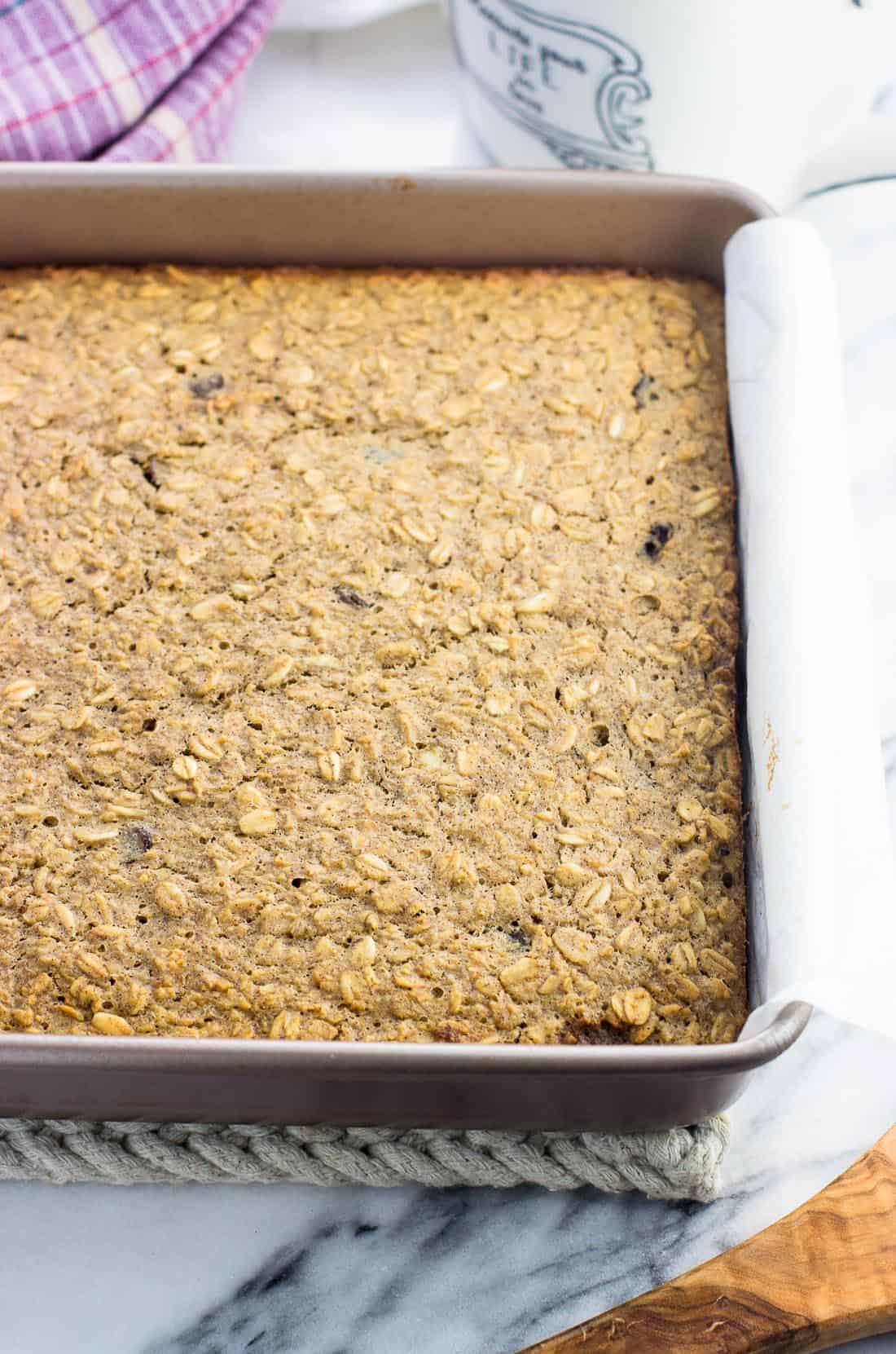 A pan of peanut butter baked oatmeal before being sliced into squares