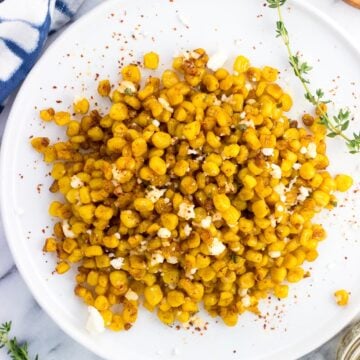 An overhead picture of roasted skillet corn on a plate