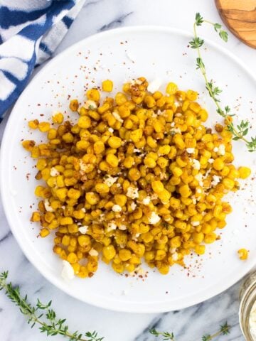 An overhead picture of roasted skillet corn on a plate