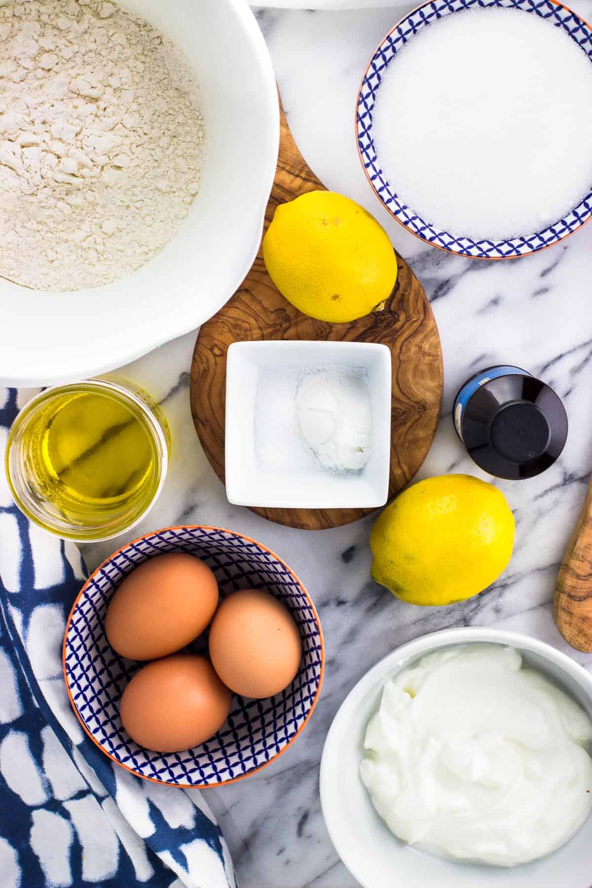 The recipe ingredients in separate bowls on a marble board.