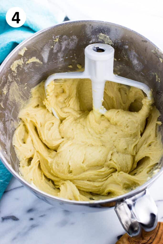 The batter and paddle attachment in the mixing bowl before adding blueberries.