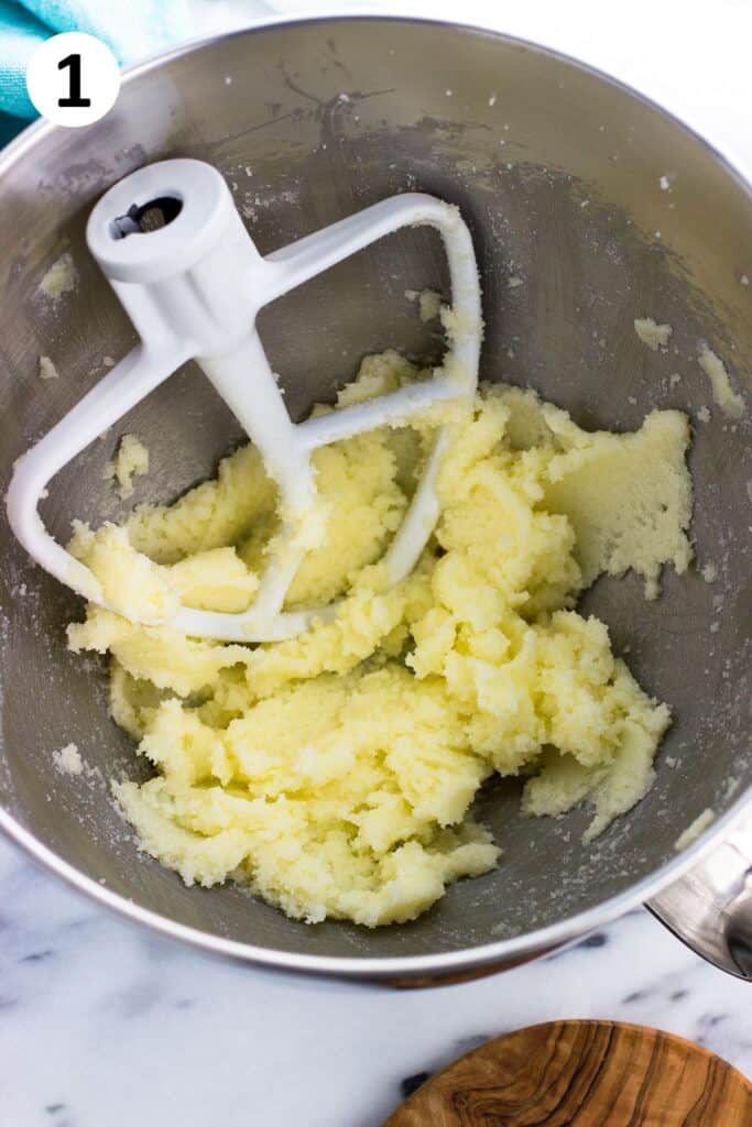 Creamed butter and sugar in a mixing bowl with the paddle attachment.