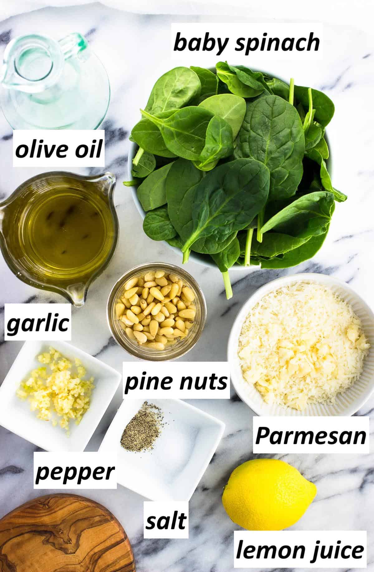 Recipe ingredients on a marble board labeled with text.