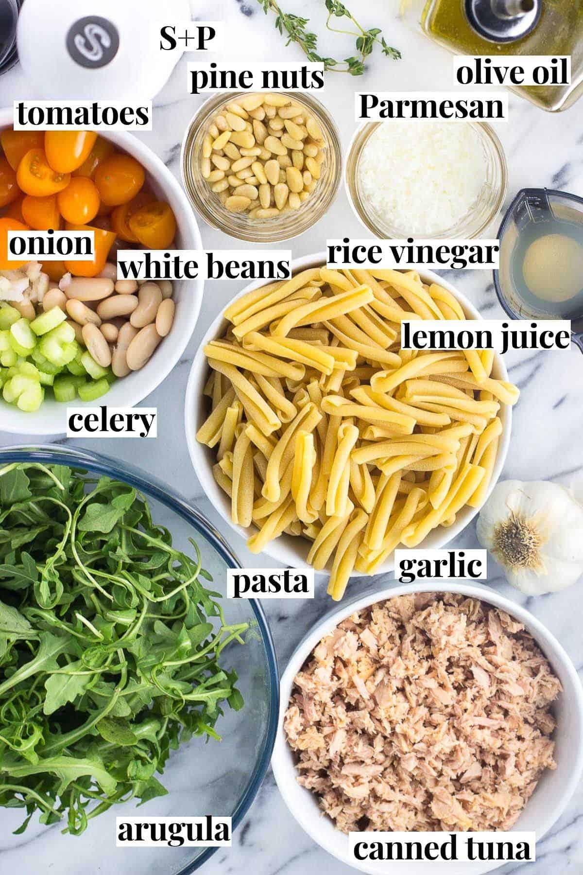 Recipe ingredients in separate bowls with text labels.