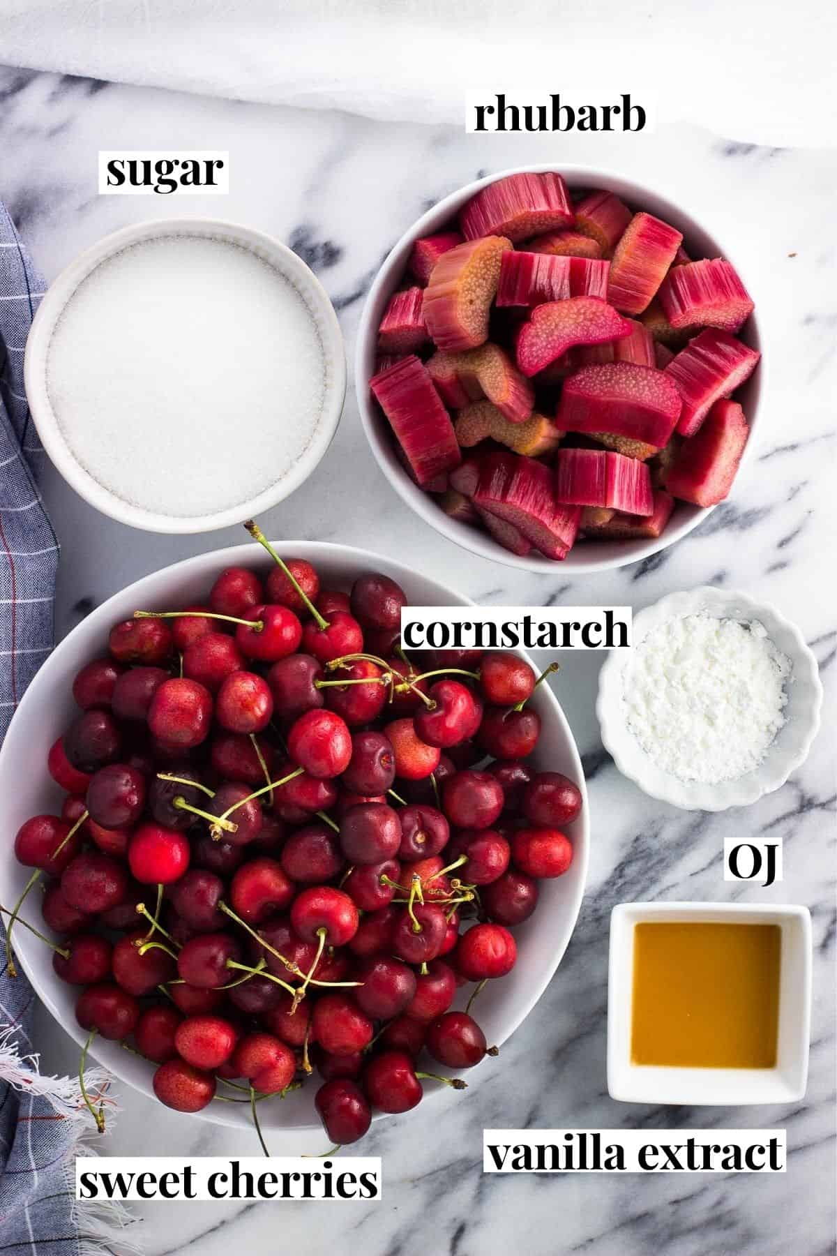 Labeled fruit recipe ingredients in separate bowls.