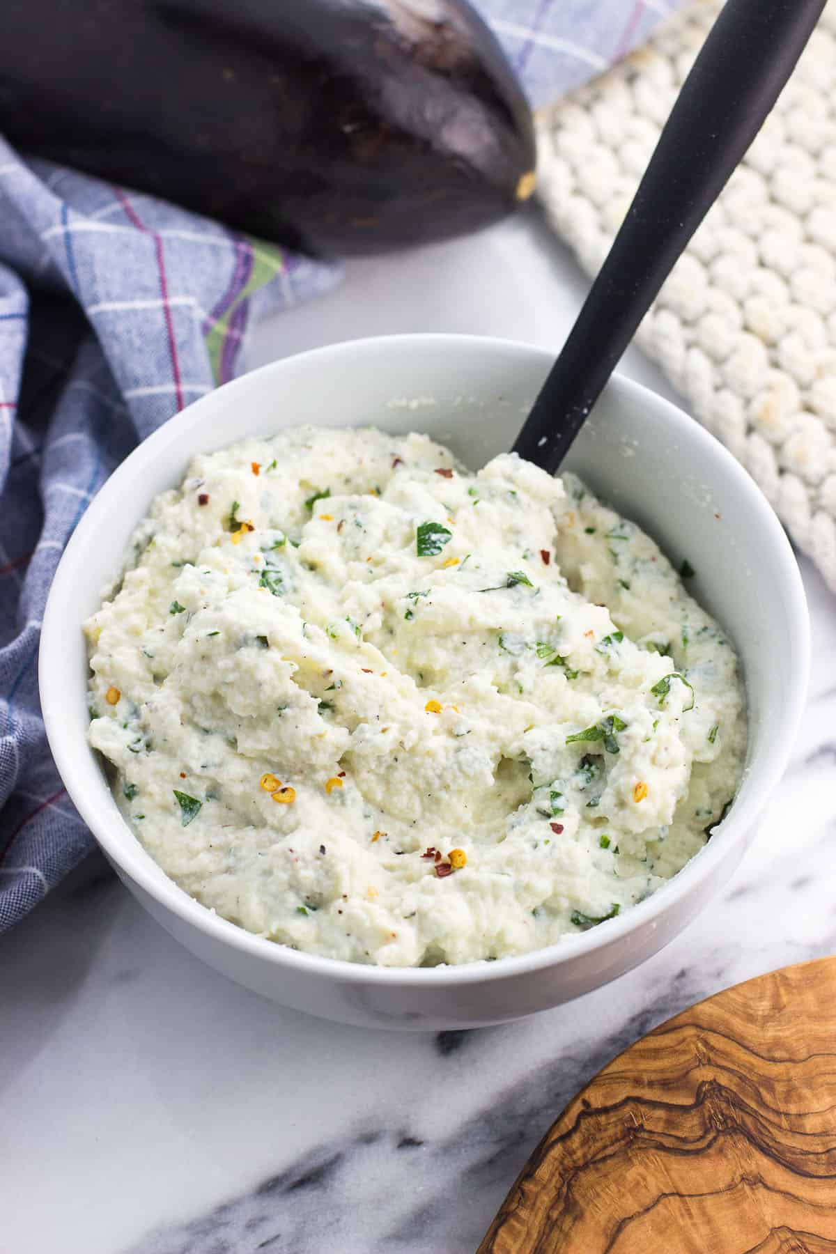 Ricotta filling stirred together in a bowl.