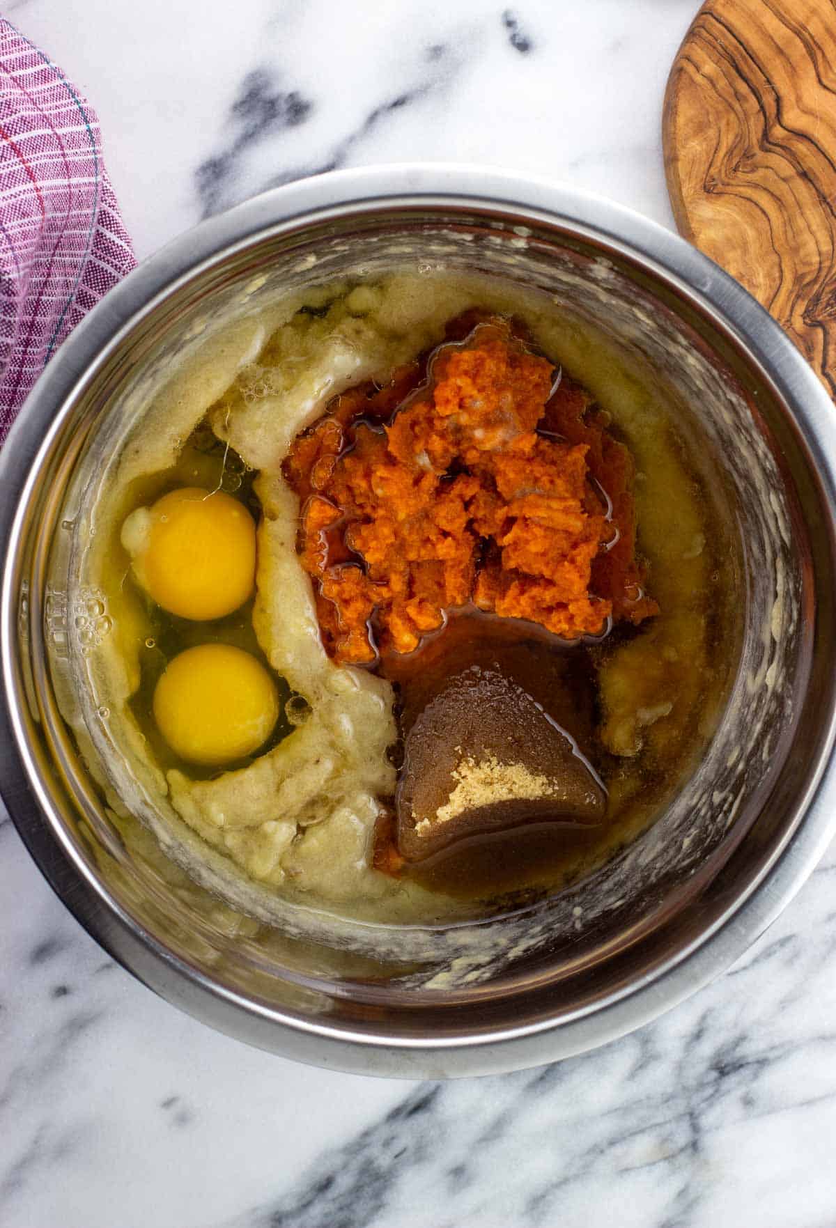 All wet ingredients added to a bowl before mixing.