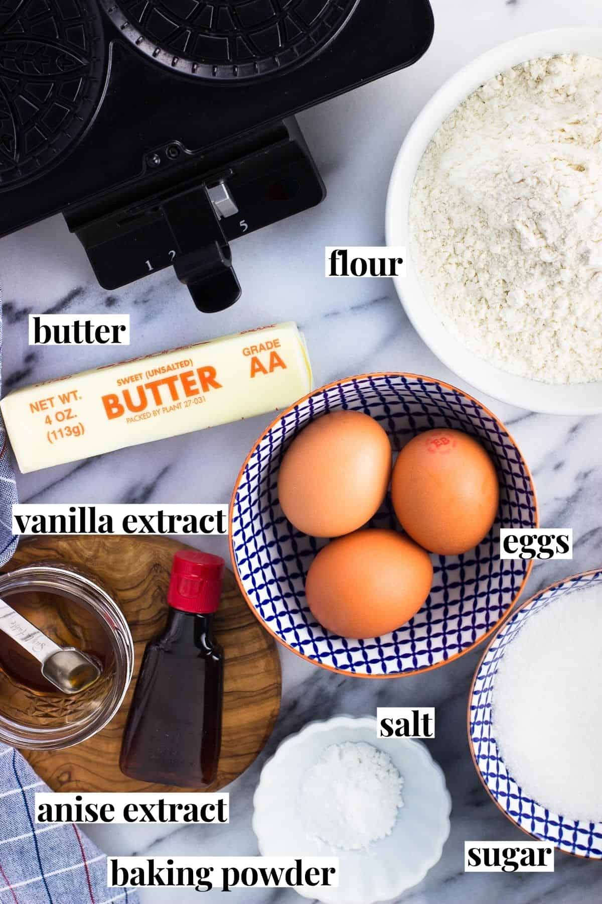 Labeled recipe ingredients on a marble board.