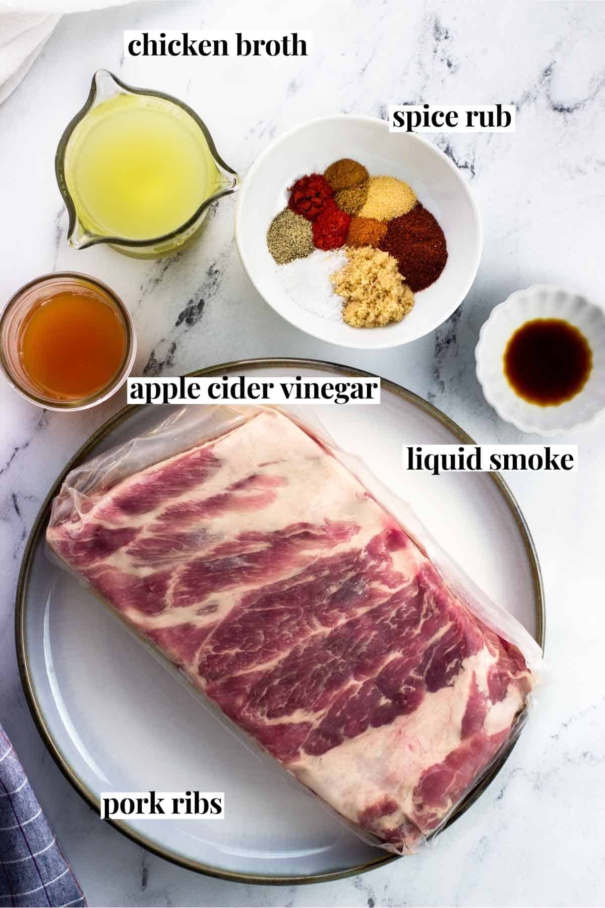 Labeled Instant Pot ribs ingredients on a marble board.