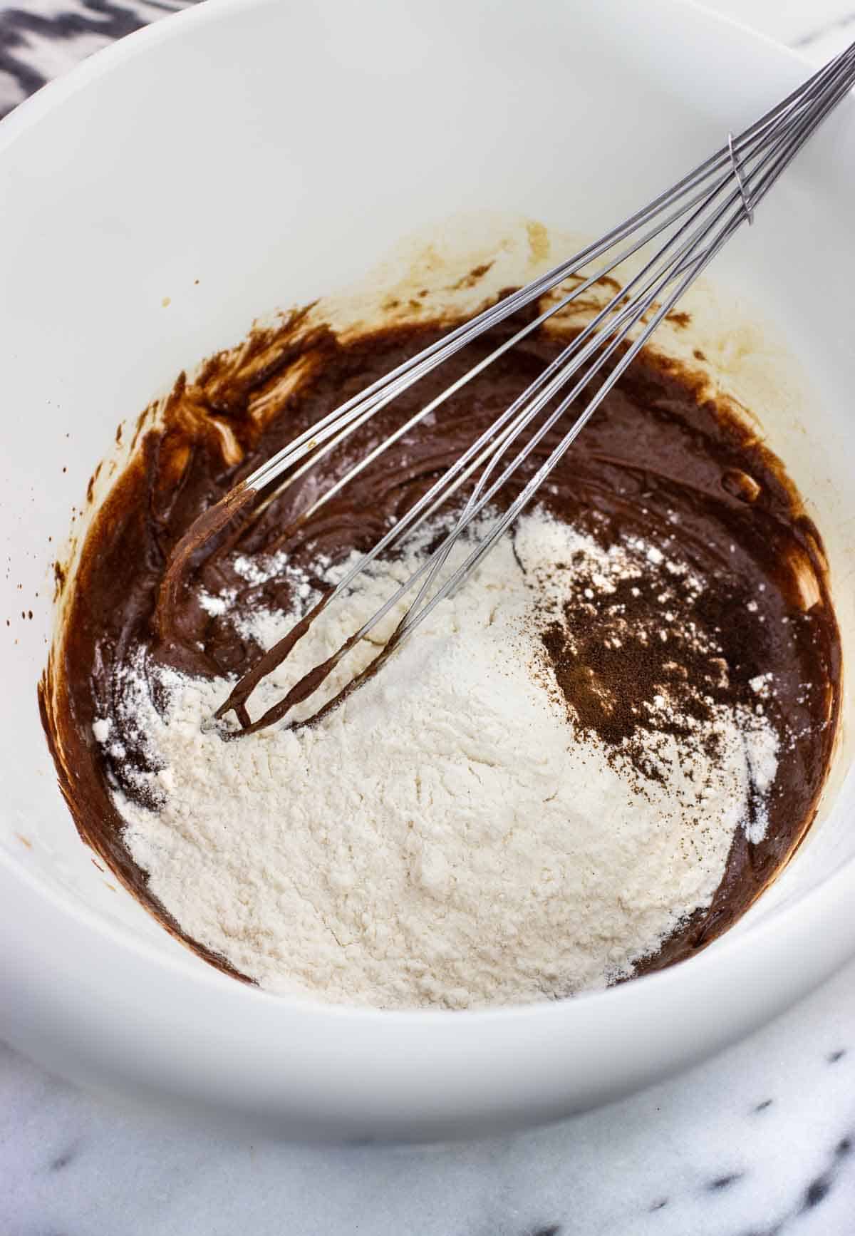 Dry ingredients added to the bowl with the wet ingredients.